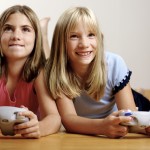 2 Girls playing video game